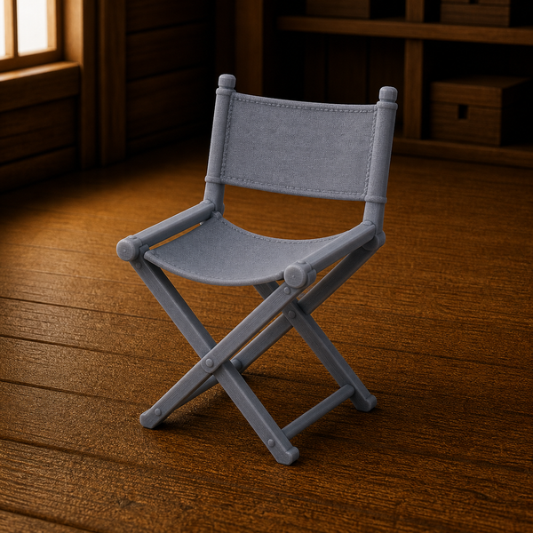 Folding Campaign Chair - officer's folding campaign chair with X-frame and canvas seat, 1:35 scale grey resin miniature.
