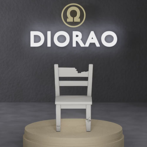 Broken Leg Chair - wooden chair with one leg snapped, tilted at angle, 1:35 scale grey resin miniature.